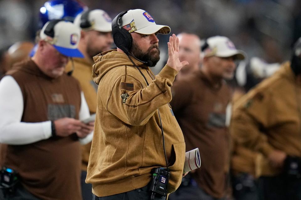 New York Giants head coach Brian Daboll gestures on the sidelines in the first half of an NFL football game against the Dallas Cowboys, Sunday, Nov. 12, 2023, in Arlington, Texas. (AP Photo/Julio Cortez)