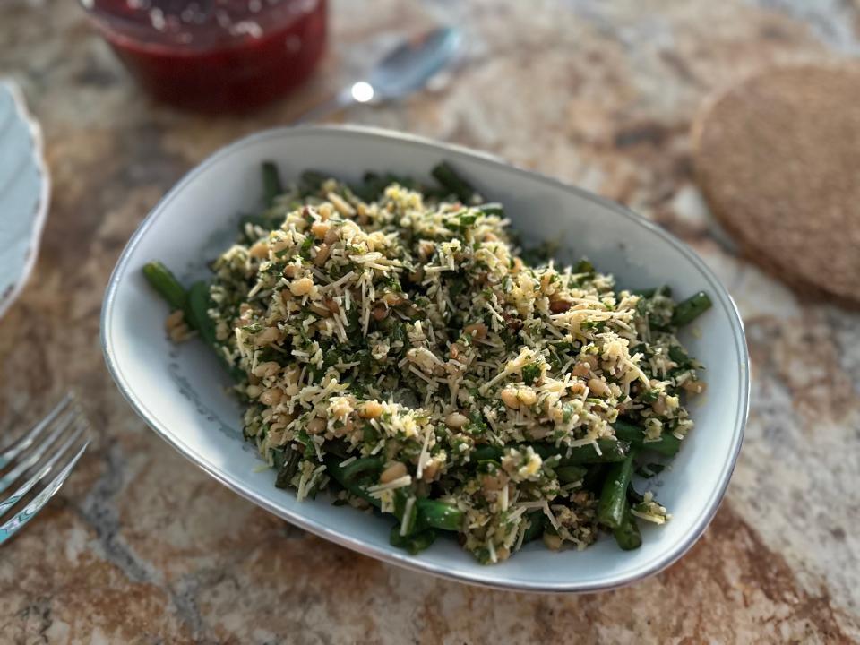 Baked green beans in a white pan