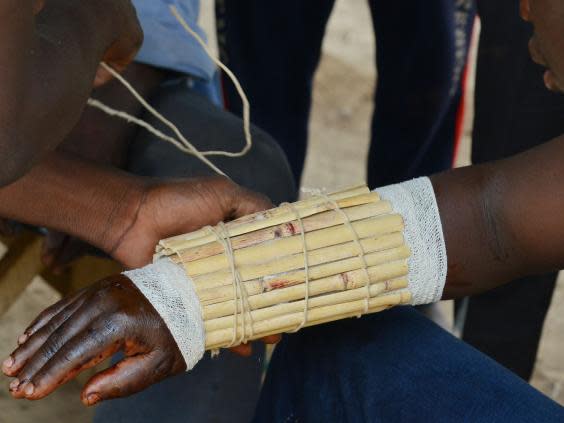 In Africa, traditional healers stand in the way of combating Ebola