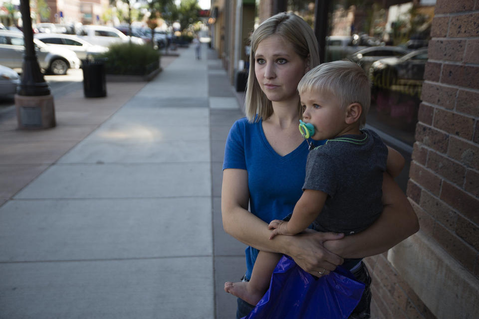 Marlayna Walker holds her 18-month-old son, Zeke, in downtown Gillette, Wyoming. While she has opinions on hot-button social issues,&nbsp;Walker doesn't necessarily want the state legislature to&nbsp;pass laws on&nbsp;those topics. (Photo: Josh Galemore/Casper Star-Tribune)