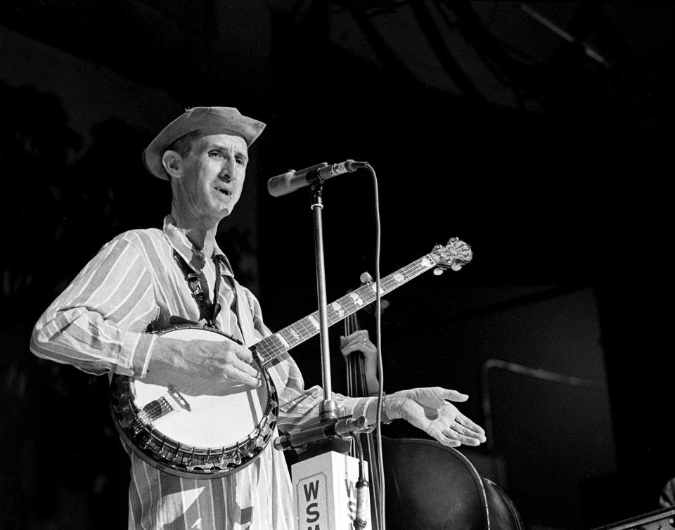 David “Stringbean” Akeman is performing for the audience during the Grand Ole Opry show at the Ryman Auditorium on Jan. 14, 1967.