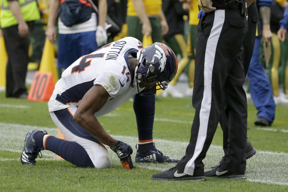 Denver Broncos wide receiver Courtland Sutton pleads with an official that his feet were in bounds after making a catch during the second half of an NFL football game against the Green Bay Packers, Sunday, Sept. 22, 2019, in Green Bay, Wis. (AP Photo/Mike Roemer)