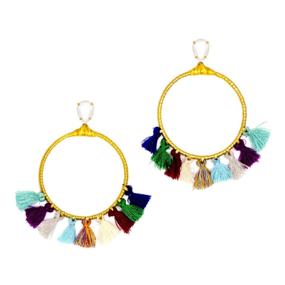 Long live tassels. <a href="https://www.ahalife.com/product/149000038807/swarovski-hoop-earrings-the-jdita" target="_blank">Check them out here</a>.&nbsp;