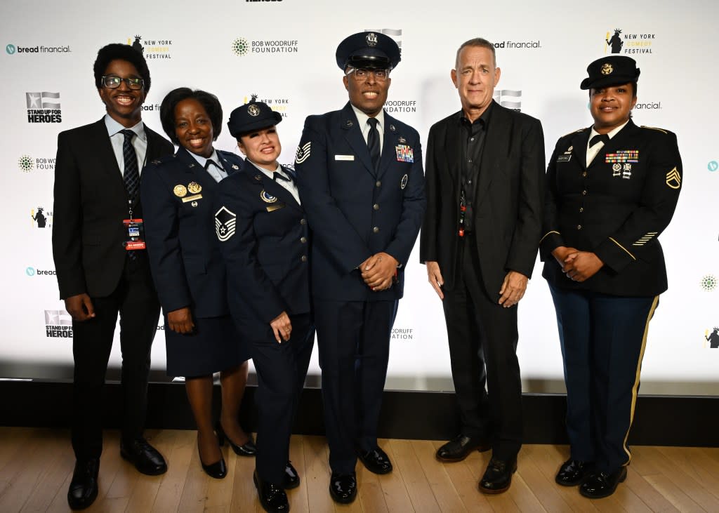 NEW YORK, NEW YORK - NOVEMBER 06: Tom Hanks (C) and Members of the Color Guard Formation attend the 17th Annual Stand Up For Heroes Benefit presented by Bob Woodruff Foundation and NY Comedy Festival at David Geffen Hall on November 06, 2023 in New York City. (Photo by Slaven Vlasic/Getty Images for Bob Woodruff Foundation)