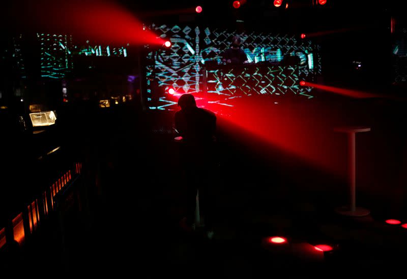 A man attends an LGBT event held at a club at Shibuya, amid the COVID-19 outbreak, in Tokyo