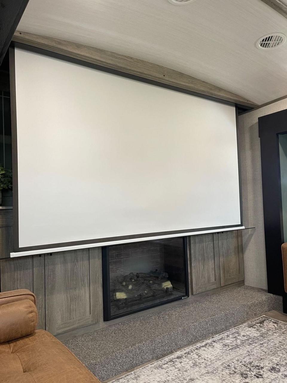 Jaren Garcia added a drop-down projector to the living room.