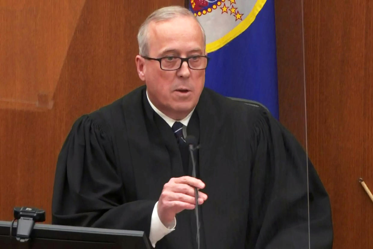 Hennepin County District Judge Peter Cahill speaks with the jury before announcing their verdict of guilty on all counts against former Minneapolis police officer Derek Chauvin in Minneapolis on April 20, 2021. (Pool via Reuters file)