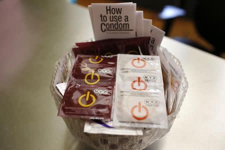 A bowl of free New York City condoms are seen in a lobby at the AIDS Service Center of New York City (ASC/NYC) lower Manhattan headquarters July 3, 2012. Picture taken July 3, 2012. REUTERS/Mike Segar/Files