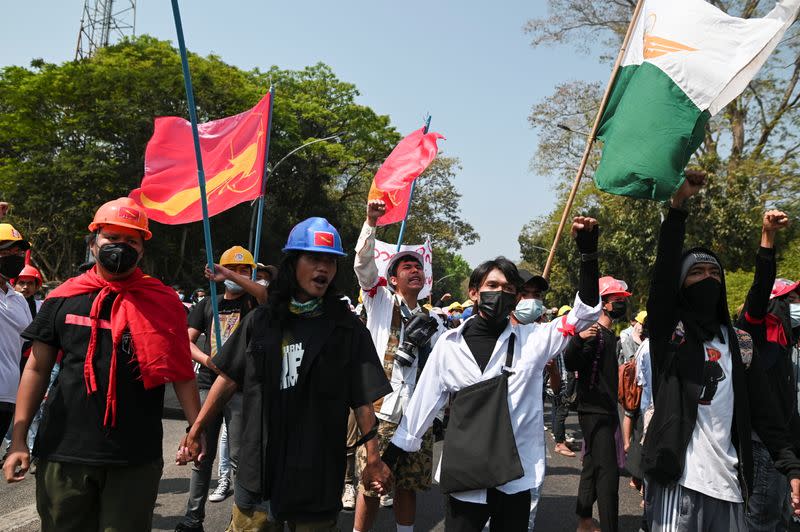 Demonstrators rally against the military coup at the University of Yangon