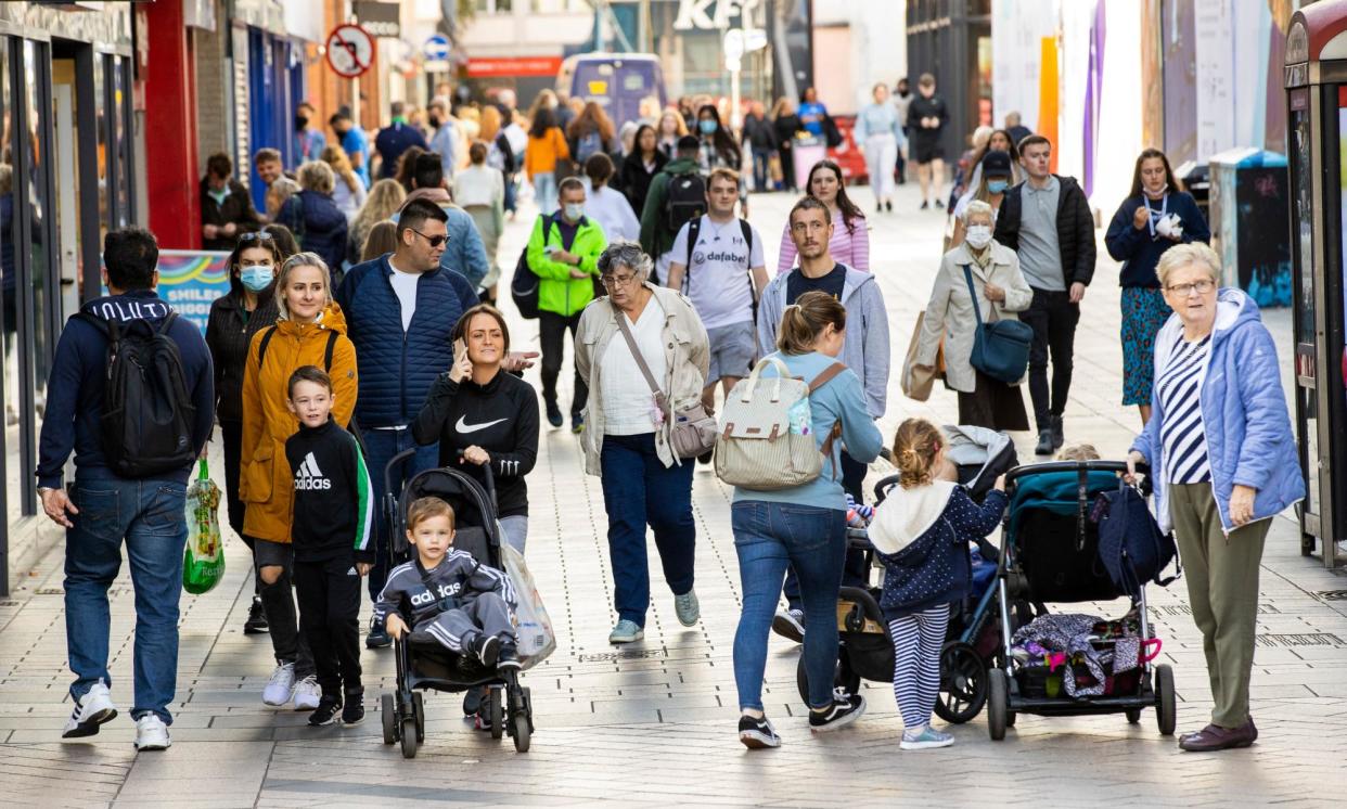 <span>Shoppers on the high street in Belfast. The year-long trial involved 585 men from Belfast, Bristol and Glasgow.</span><span>Photograph: Liam McBurney/PA</span>