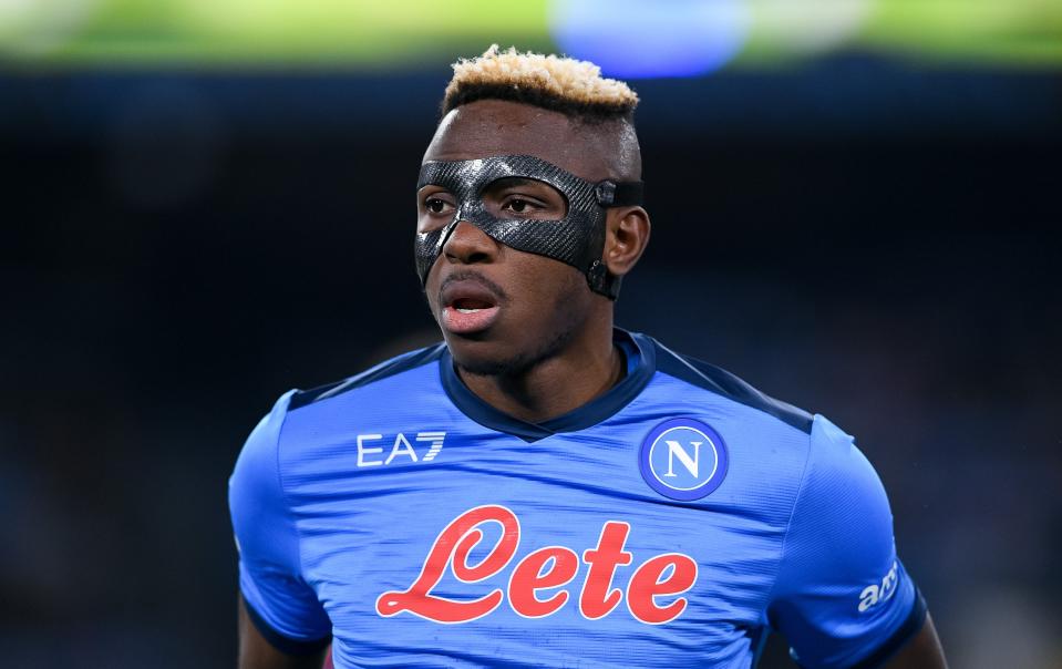   Napoli striker Victor Osimhen, wearing a protective face mask 