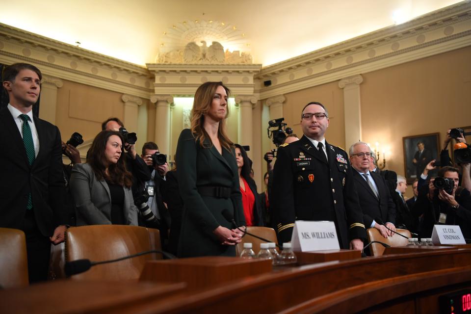 Jennifer Williams, a foreign policy aide to Vice President Mike Pence, and Army  Lt. Col. Alexander Vindman, a Ukraine expert for the National Security Council, testify on Nov. 19, 2019.