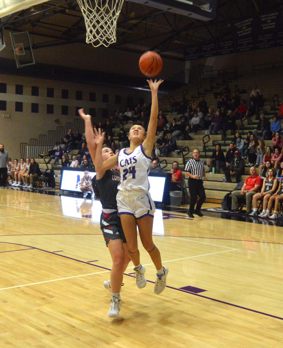 Anabelle Gill puts up a shot for Three Rivers against Constantine on Tuesday evening.