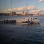 There's a plane in the Hudson. I'm on the ferry going to pick... on Twitpic