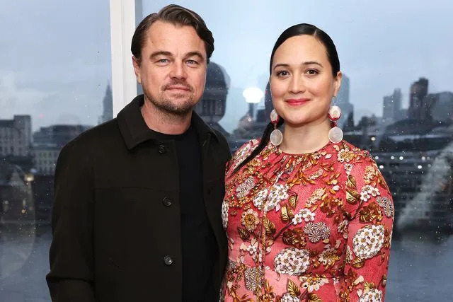 <p>Dave Benett/Getty Images</p> Leonardo DiCaprio and Lily Gladstone