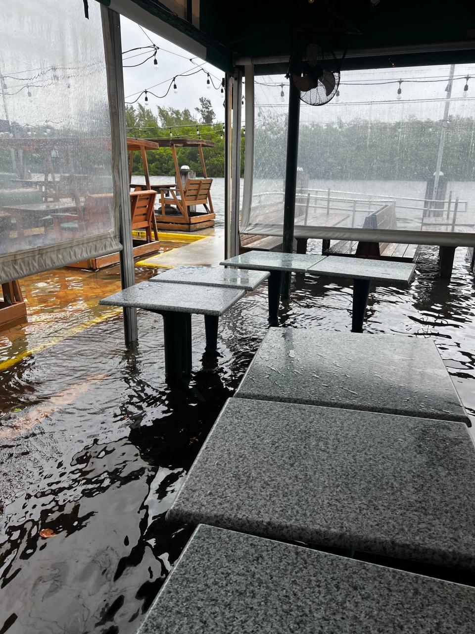 Significant flooding occurred inside Two Georges restaurant in Boynton Beach from a combination of a king tide, full moon and Hurricane Nicole.