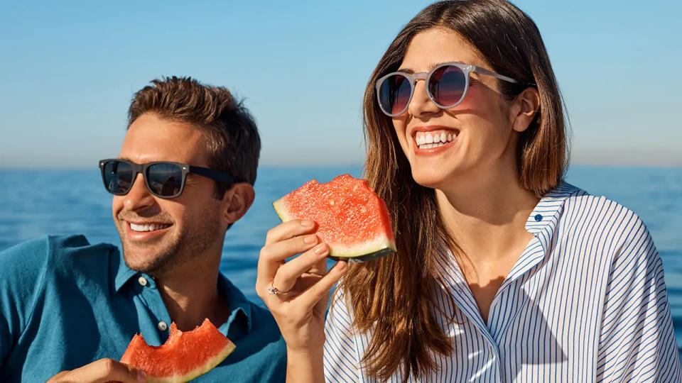 Couple eating watermelon