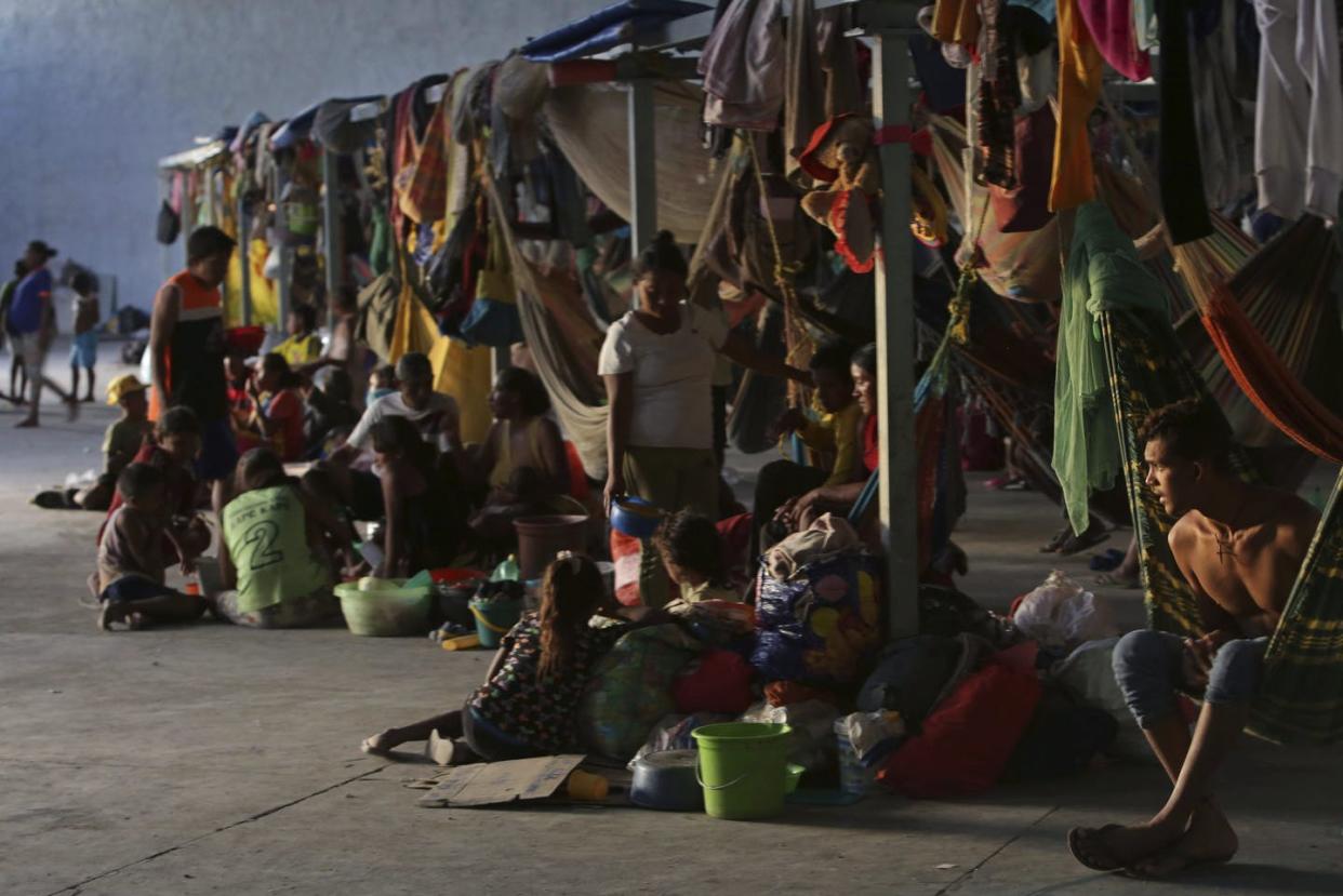 <span class="caption">Fleeing Venezuelans arrive in the municipality of Pacaraima, in northern Brazil, in 2018.</span> <span class="attribution"><span class="source">(AP Photo/Eraldo Peres) </span></span>