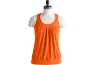 <div class="caption-credit"> Photo by: Rodale</div><b>Gaiam Pleated Tank</b> ($48, gaiam.com ) This lightweight tank feels as amazing on as it looks. Made from a blend of rayon from sustainable bamboo and Spandex, it wicks sweat and has a the keyhole opening in the back that looks stylish and will help keep you cool. Plus, the double-layer band around the hem keeps the tank in place while you move and stretch. <b><a rel="nofollow noopener" href="http://www.prevention.com/fitness/strength-training/arm-exercises?cm_mmc=Yahoo_Blog-_-PVN_Shine-_-15%20Green%20Workout%20Looks-_-Arm%20Exercises" target="_blank" data-ylk="slk:Sculpt Sexy Arms By Summer;elm:context_link;itc:0;sec:content-canvas" class="link ">Sculpt Sexy Arms By Summer</a></b>