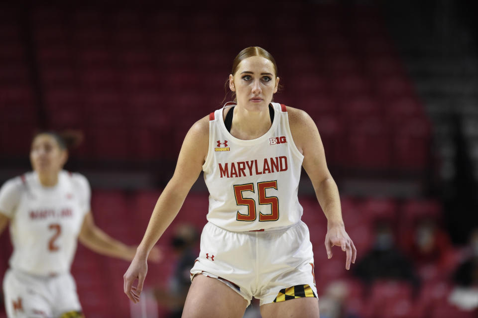 Maryland's Chloe Bibby defends against UNC Wilmington during the first half of an NCAA college basketball game on Thursday, Nov. 18, 2021, in College Park, Md. (AP Photo/Gail Burton)