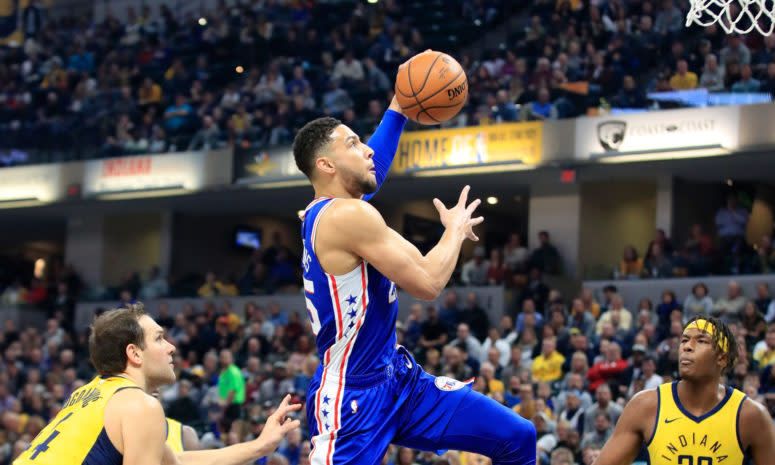 Ben Simmons going up for a dunk during a game against the Indiana Pacers in 2018.