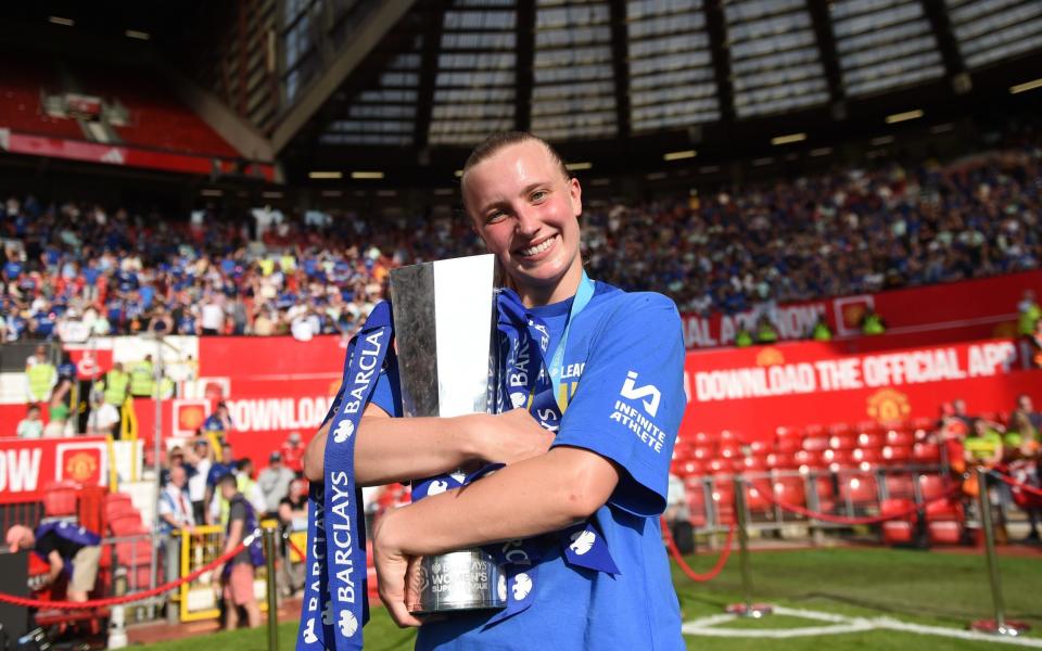 Aggie Beever-Jones celebrates with the Women's Super League trophy