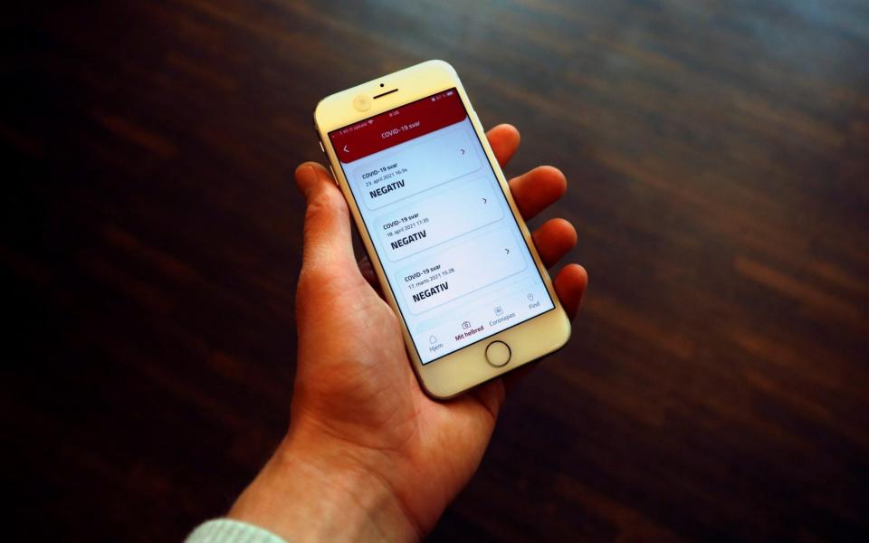 A cell phone with the Covid-19 passport app, in Copenhagen - TIM BARSOE/REUTERS