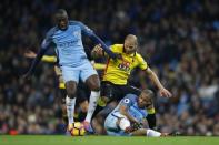 Britain Football Soccer - Manchester City v Watford - Premier League - Etihad Stadium - 14/12/16 Manchester City's John Stones (L) and Fernando in action with Watford's Adlene Guedioura Reuters / Phil Noble Livepic