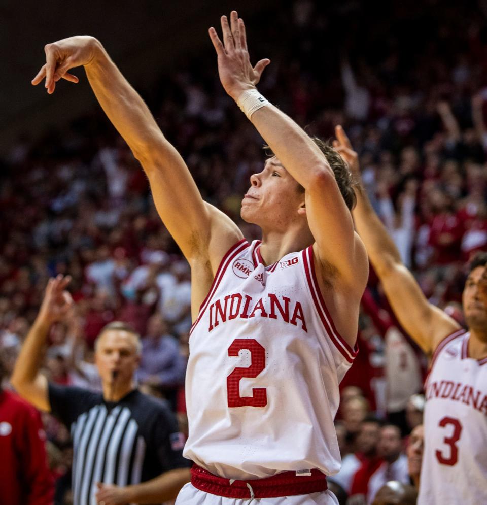 Indiana's Gabe Cupps (2) watches his three-pointer go in during the second half of the Indiana versus Army men's basketball game at Simon Skjodt Assembly Hall on Sunday, Nov. 12. 2023.