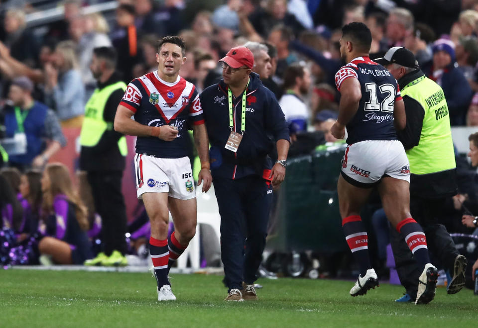 SYDNEY, AUSTRALIA - SEPTEMBER 30:  Cooper Cronk of the Roosters is taken from the field injured in the final minutes during the 2018 NRL Grand Final match between the Melbourne Storm and the Sydney Roosters at ANZ Stadium on September 30, 2018 in Sydney, Australia.  (Photo by Matt King/Getty Images)