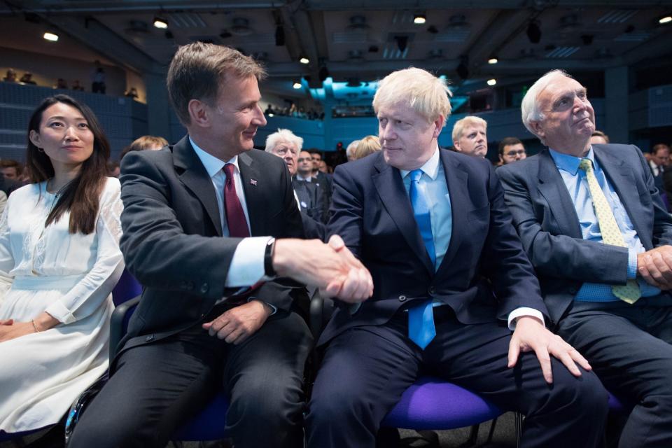 Sir Edward Lister (far right) sits beside Boris Johnson as he is named the new Tory Party leader (PA)