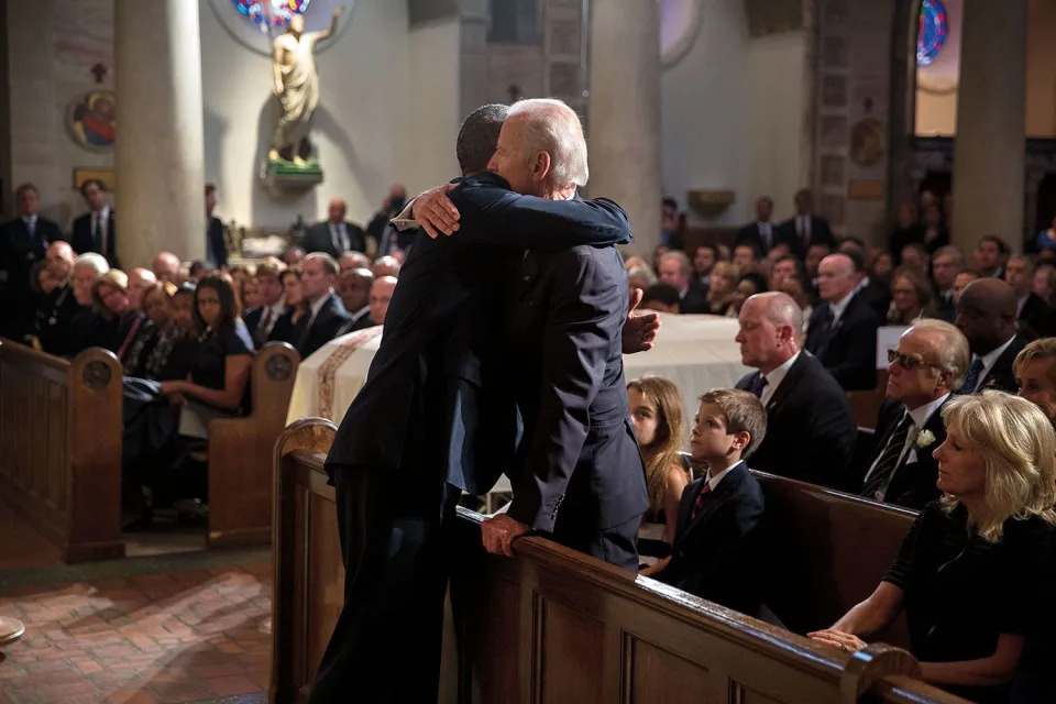 Barack Obama hugs Joe Biden at Beau Biden's funeral.