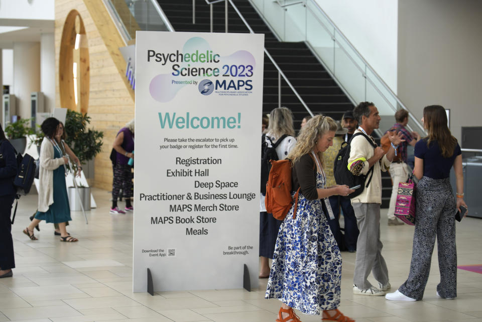 Participants enter the Psychedelic Science conference in the Colorado Convention Center Wednesday, June 21, 2023, in Denver. (AP Photo/David Zalubowski)