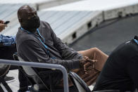 Charlotte Hornets owner Michael Jordan watches the second half of the team's NBA basketball game against the Detroit Pistons in Charlotte, N.C., Thursday, March 11, 2021. (AP Photo/Jacob Kupferman)