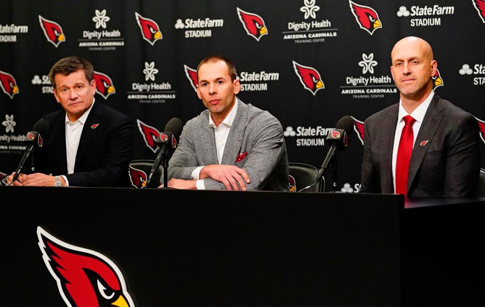 Jonathan Gannon (center) is introduced as the new head coach of the Arizona Cardinals during a news conference at the Cardinals training facility in Tempe on Feb. 16, 2023.