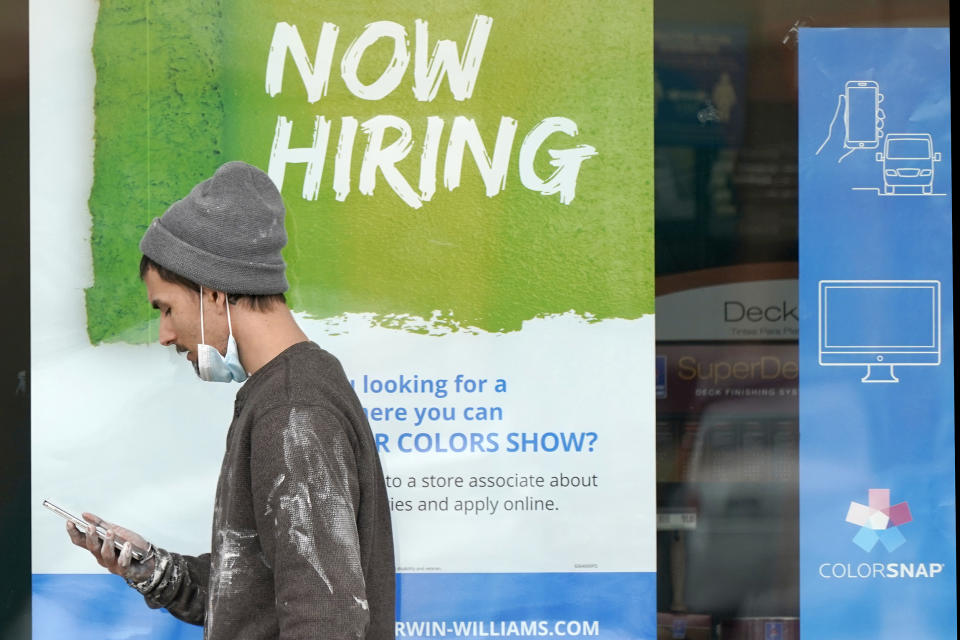 Image: A 'Now Hiring' sign at a Sherwin Williams store in Woodmere Village, Ohio (Tony Dejak / AP file)