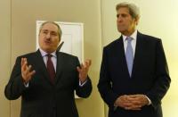 U.S. Secretary of State John Kerry (R) and Jordanian Foreign Minister Nasser Judeh address medias following their meeting on Syria in Geneva, on May 1, 2016