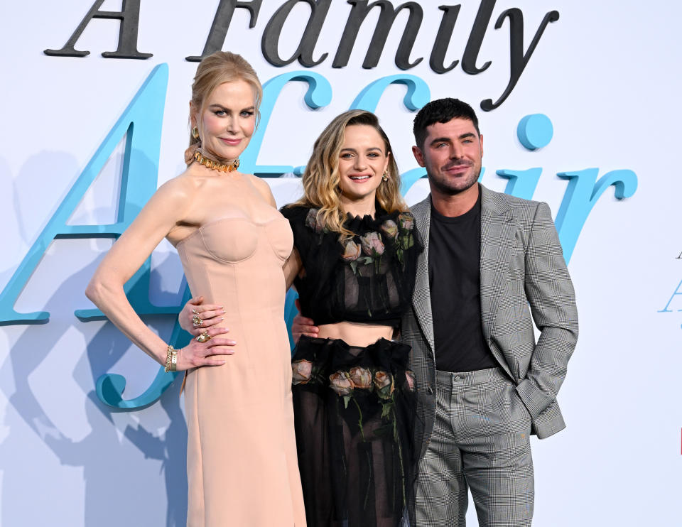 Nicole Kidman, Joey King, and Zac Efron at the premiere of "A Family Affair," posing together in elegant attire