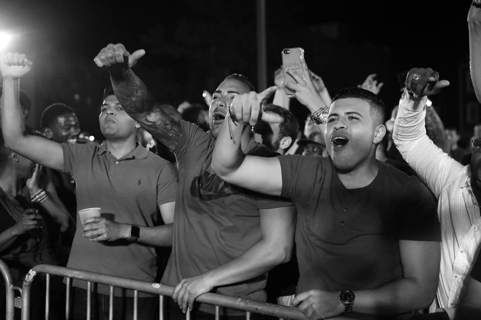 <p>The air grew thick with the smell of cigars, as the increasingly rowdy crowd continued to smoke and drink as the night went on at the Brooklyn Smoker on Aug. 24, 2017. (Photo: Gordon Donovan/Yahoo News) </p>