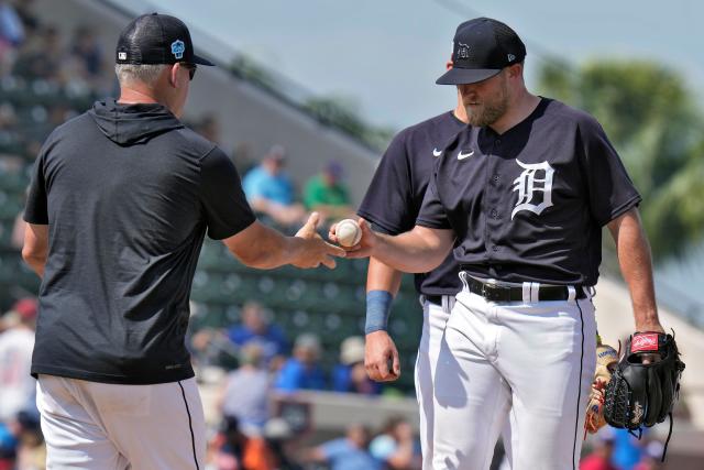 Tigers pitcher Will Vest, right, hands the ball to manager A.J. Hinch as he is taken out of the game against the Blue Jays during the fourth inning of the Tigers' 18-5 spring training game loss on Saturday, March 4, 2023, in Lakeland, Florida.