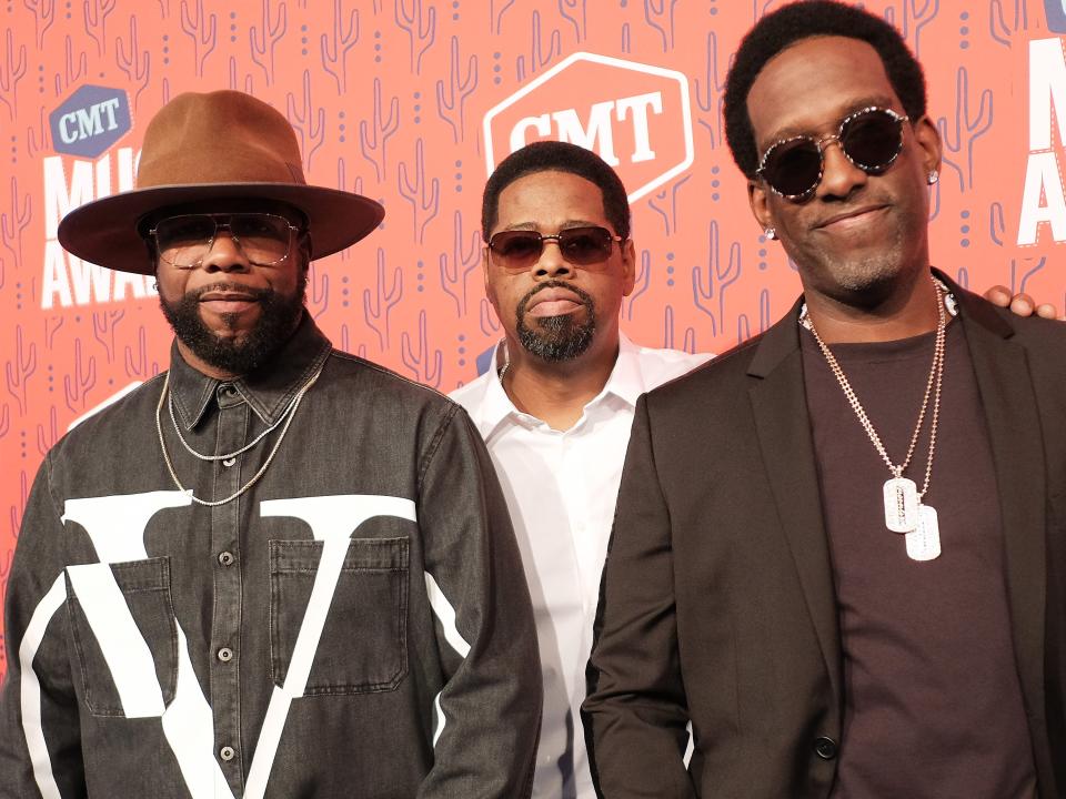 Boys II Men on the red carpet of the CMT awards in 2019.