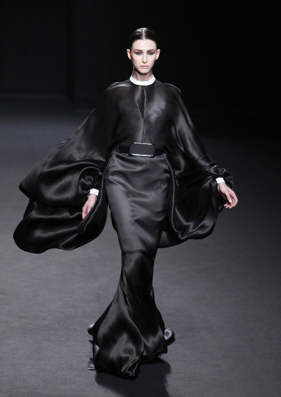 A model wears a creation by French fashion Stephane Rolland's Haute Couture Fall-Winter 2013-2014 collection presented Tuesday, July 2, 2013 in Paris. (AP Photo/Francois Mori)