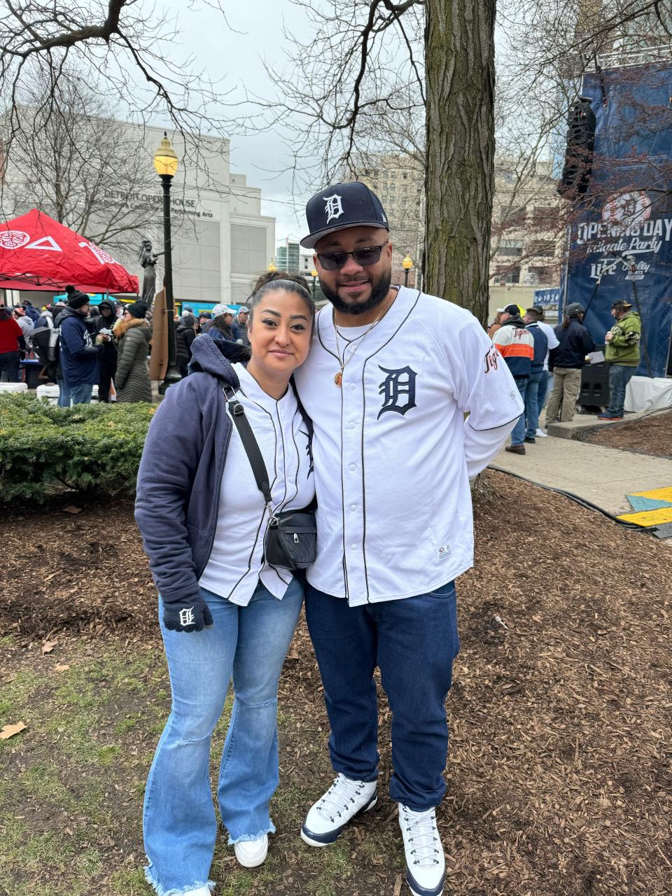 Araceli Ambers, 41, and Kevin Ambers, 39, both of Detroit, enjoy the tailgating festivities for Opening Day at Grand Circus Park on Friday, April 5, 2024