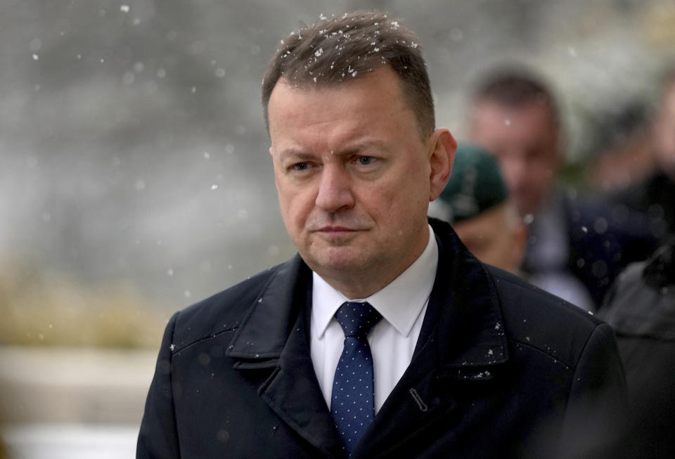 Poland's Defense Minister Mariusz Blaszczak is seen on his way to a press conference as part of the meeting of the 'Ukraine Defense Contact Group' at Ramstein Air Base in Ramstein, Germany, Friday, Jan. 20, 2023. Defense leaders are gathering at Ramstein Air Base in Germany Friday to hammer out future military aid to Ukraine, amid ongoing dissent over who will provide the battle tanks that Ukrainian leaders say they desperately need(AP Photo/Michael Probst)