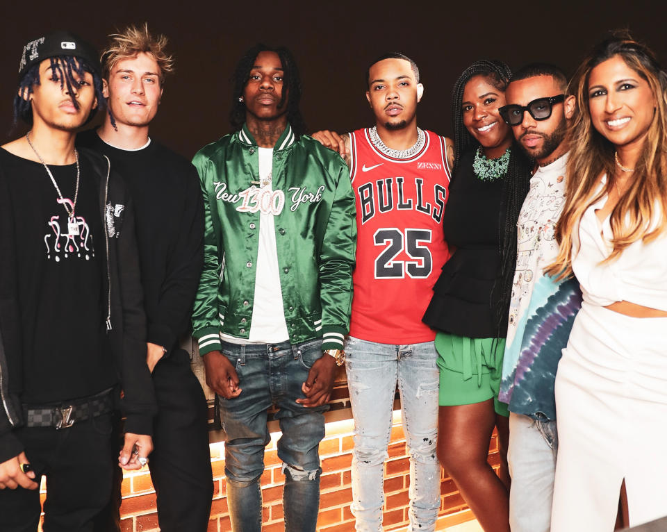 <p>Illinois House Speaker Pro Tem Jehan Gordon-Booth chats with Chicago-based artists including Polo G, G Herbo, Cole Benett and Vic Mensa at the Invest in US dinner at the Robey rooftop on July 29.</p>