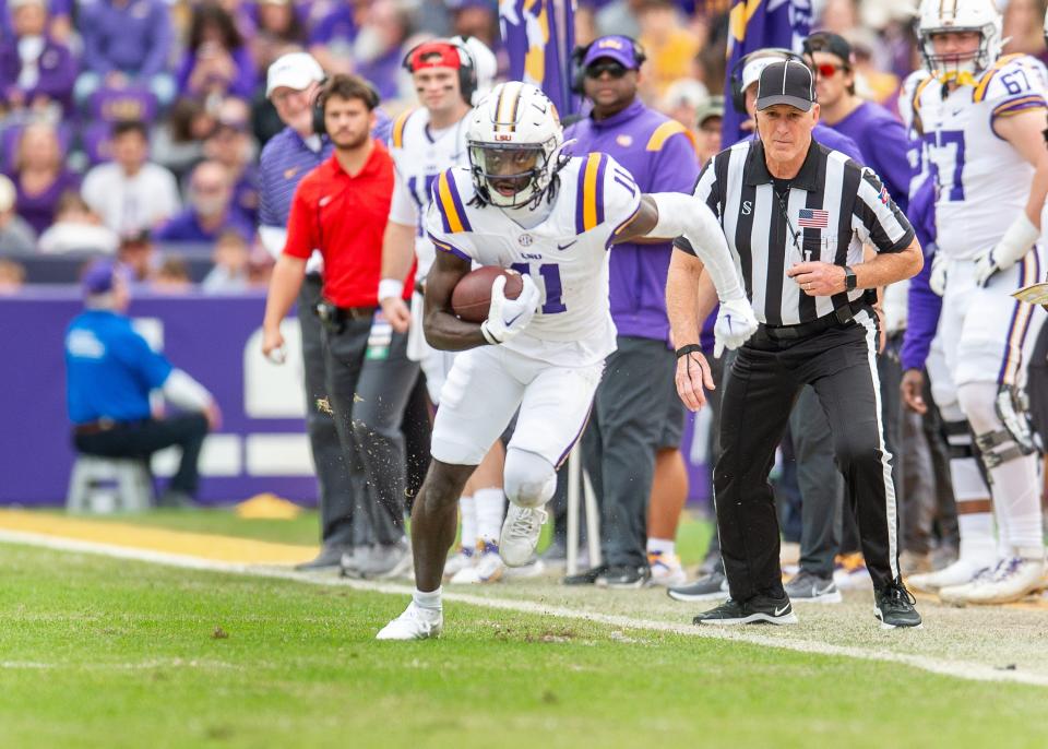 LSU receiver Brian Thomas Jr. (11), seen here running the ball against Texas A&M last season, should provide the Jaguars a vertical threat they desperate need with the departure of Calvin Ridley.