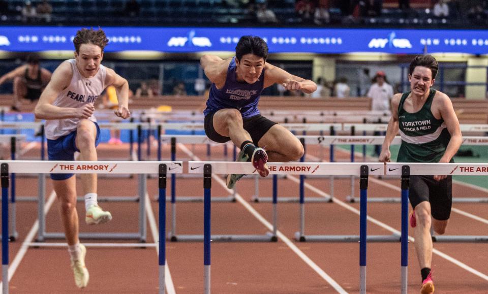 Alexander Wong of Hendrick Hudson, center, won the 55 meter hurdles during the Section 1 Class B track and field championships at The Armory in Manhattan Feb. 4, 2024.