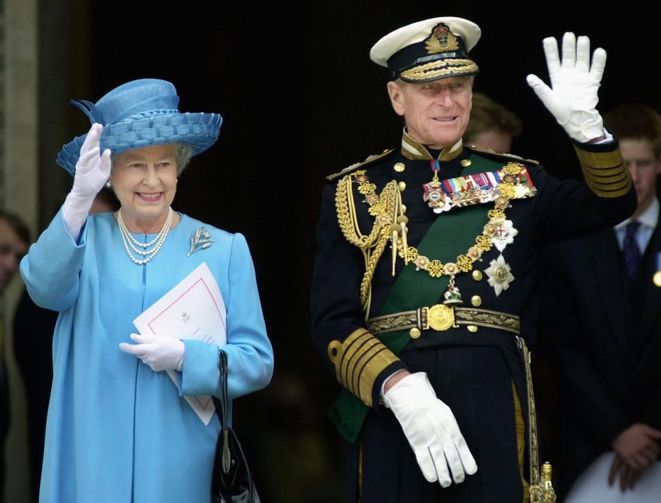 Queen Elizabeth II and Prince Philip, the Duke of Edinburgh leave St. Paul's Cathedral after a service to celebrate the Golden Jubilee in this June 4, 2002 file photo in London, England
