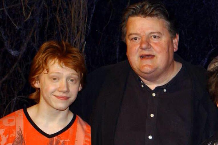 The stars of Harry Potter and the Chamber of Secrets, from left to right; Rupert Grint, Robbie Coltrane, Daniel Radcliffe Emma Watson during the worldwide launch of the DVD/VHS at Leavesden Studios in north London. (Photo by Yui Mok - PA Images/PA Images via Getty Images)