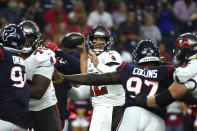 Tampa Bay Buccaneers quarterback Tom Brady (12) throws a pass against the Houston Texans during the first half of an NFL preseason football game Saturday, Aug. 28, 2021, in Houston. (AP Photo/Eric Christian Smith)